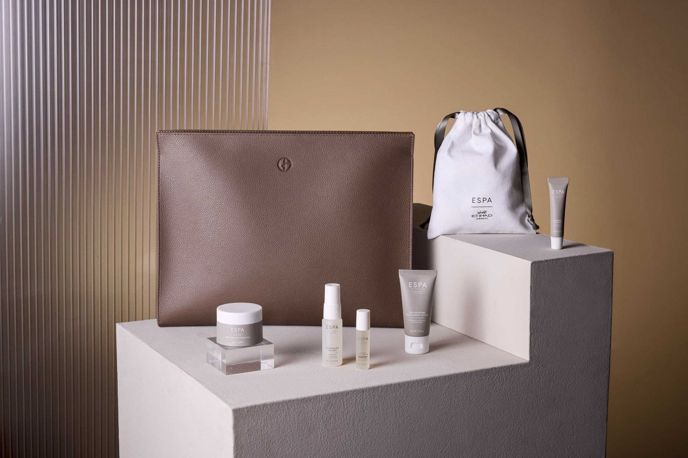 a group of cosmetic products on a white surface